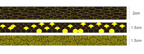 Three rolls of decorative tape with black and gold patterns on a white background.