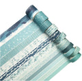 Set of rolls of washi tape with various patterns on a white background