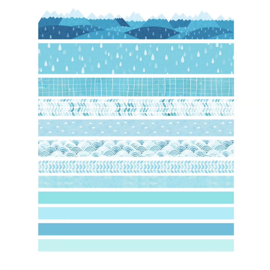 Collection of blue patterned washi tape strips on a white background