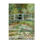 Framed artwork of a bridge over water lilies with a black cat on the bridge.