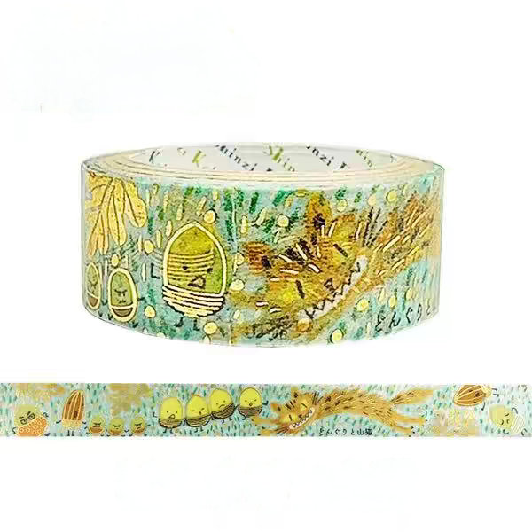 A roll of decorative washi tape with a whimsical illustrated pattern in yellow, green, and beige tones, shown above a flat strip of the same tape on a white background.
