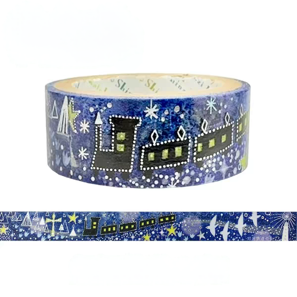 A roll of decorative washi tape featuring a winter night scene with a train, stars, and snowflakes in blue, white, and yellow, shown with a flat strip of the tape below on a white background.