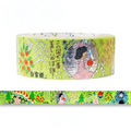 A roll of decorative washi tape with a light green background and whimsical illustrated characters, Japanese text, and small red and orange motifs, shown with a strip unrolled below on a white background.