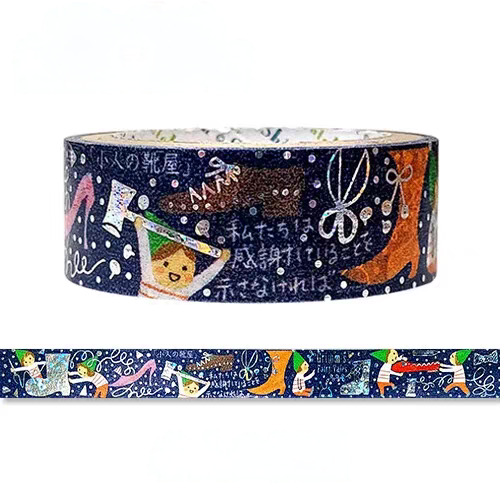 A roll of decorative washi tape with a dark navy blue background, white Japanese text, and whimsical illustrations including a rabbit, a cat, and colorful objects, shown with a narrow strip unrolled below on a white background.