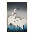 Framed artwork of white cranes in a snowy landscape